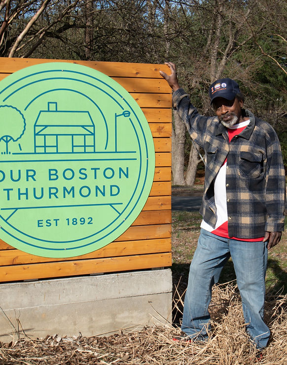 Boston Thurmond Sign and man